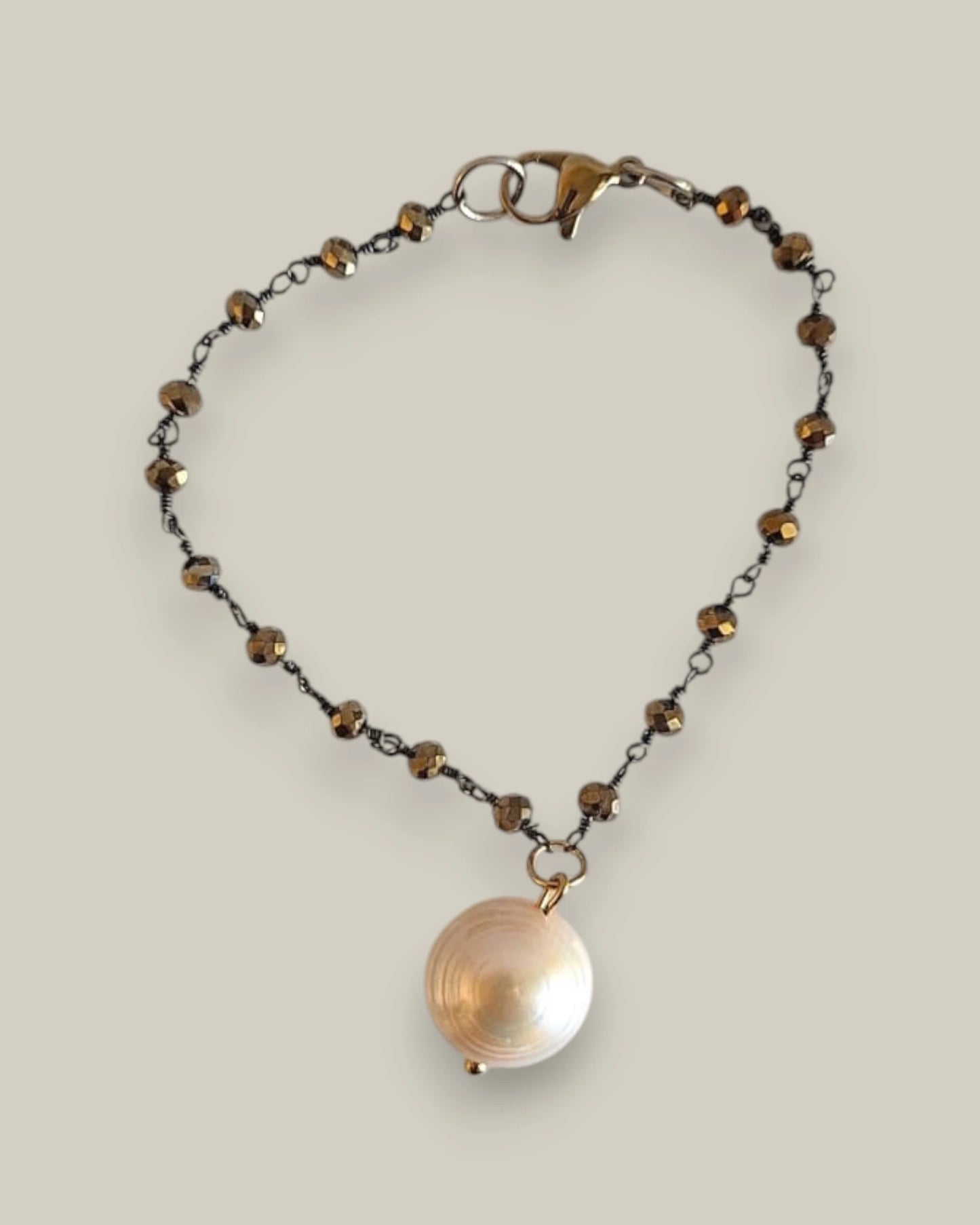 Gioielli artigianali - Bracciale con perla barocca.